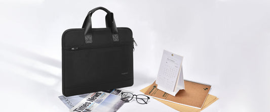 TIGERNU T-L5239 laptop bag showing dimensions and capacity for 15.6-inch laptop with shock-resistant airbag design