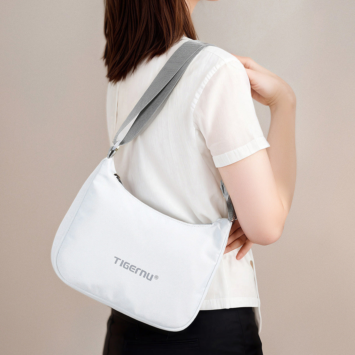 TIGERNU T-S81188 Sac à bandoulière compact 2 L compatible tablette multi-compartiments