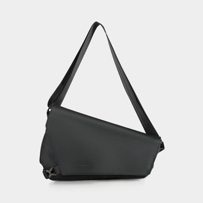 Front view of a black crossbody bag with model T-S8097 no logo